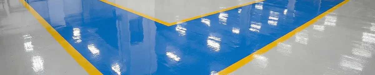 A factory floor professionally covered and marked with epoxy flooring in San Diego, CA