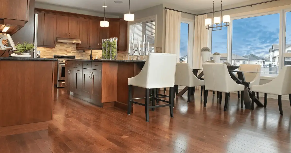 A modern kitchen with professionally installed wood flooring in San Diego, CA