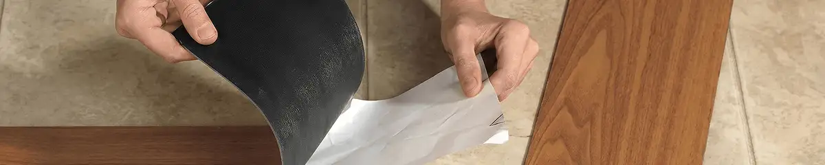 A professional installing vinyl flooring in San Diego, CA